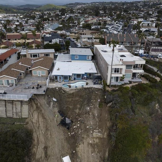 California buildings still in peril from tumbling cliff